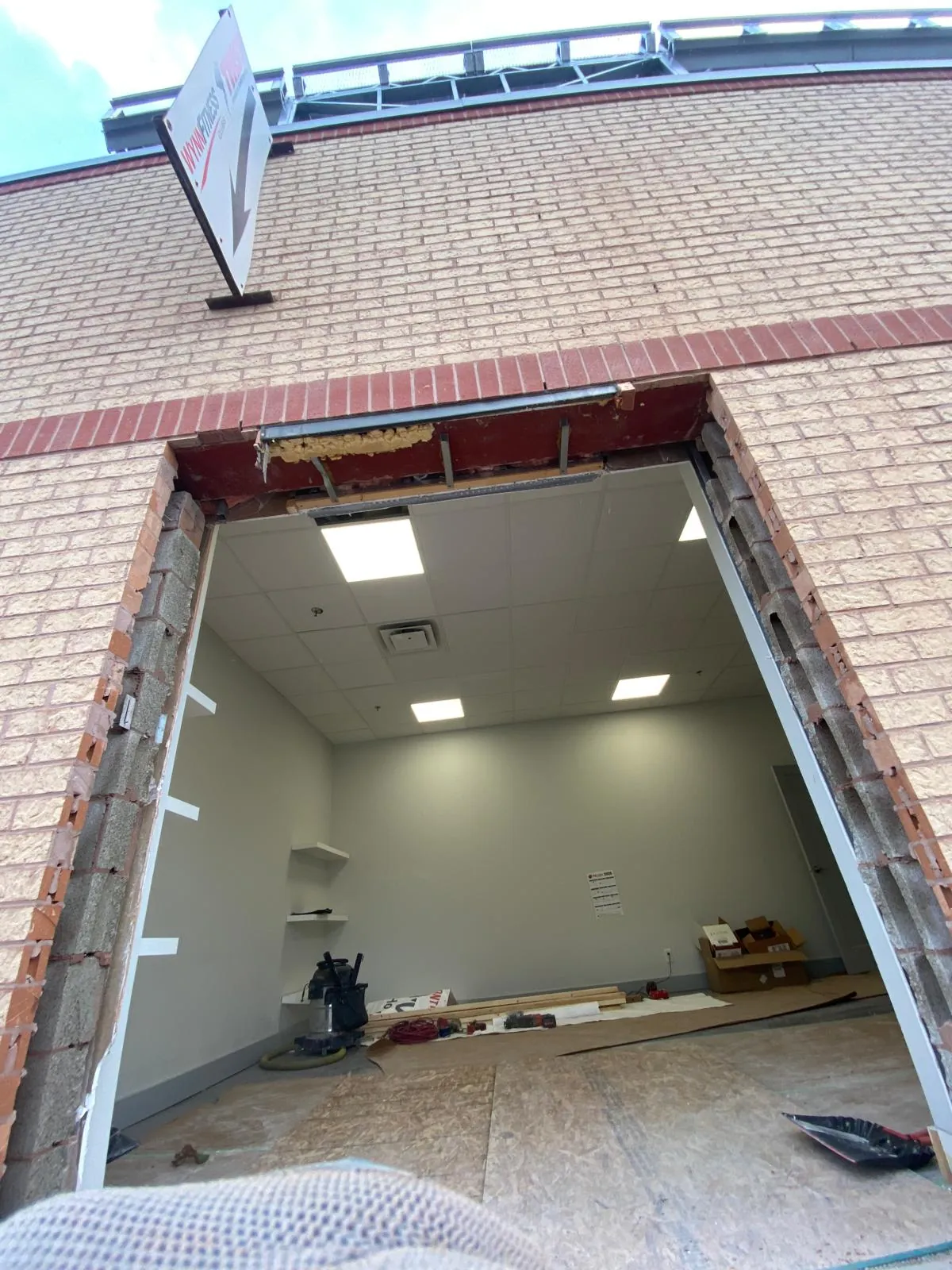 Brick wall opening — interior fit-out