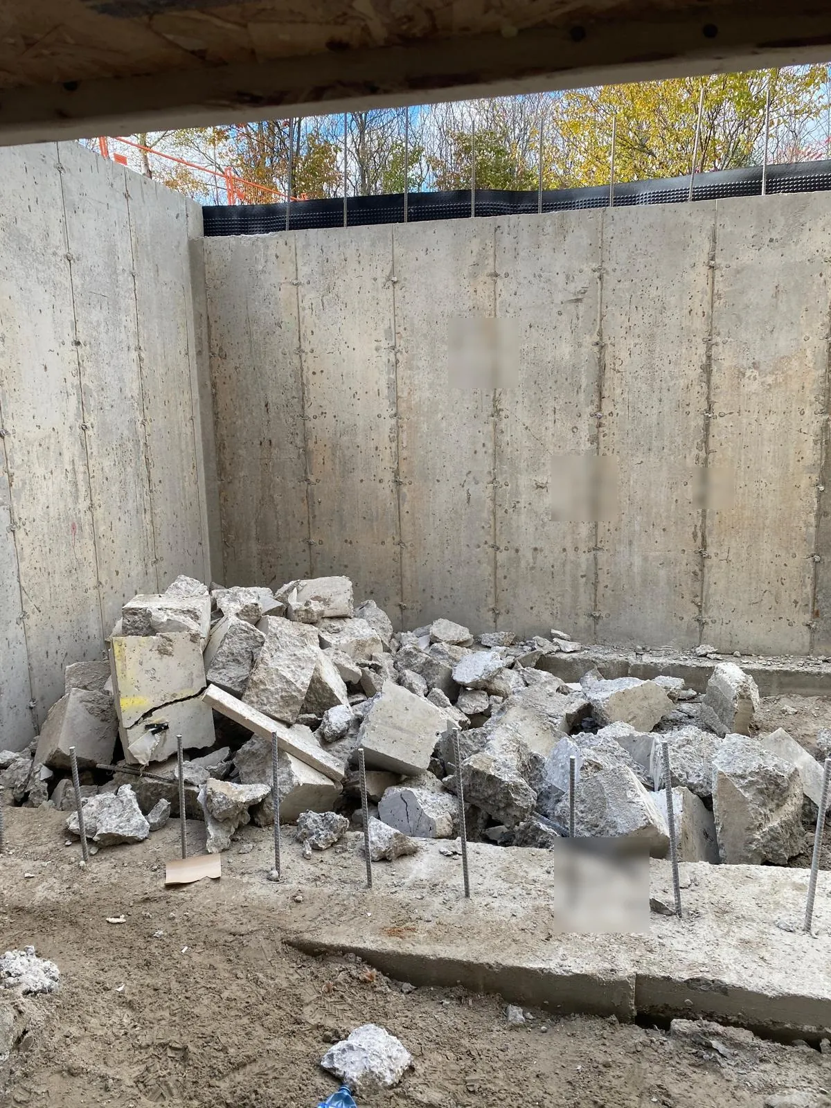 Broken concrete pile — removed
