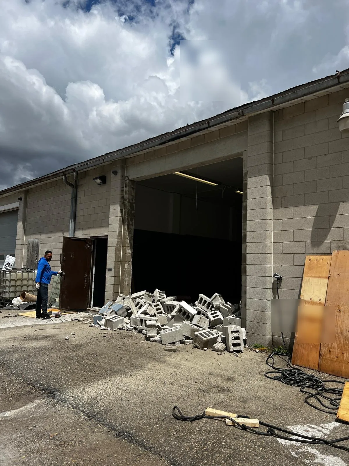 Warehouse door openings cut into concrete wall