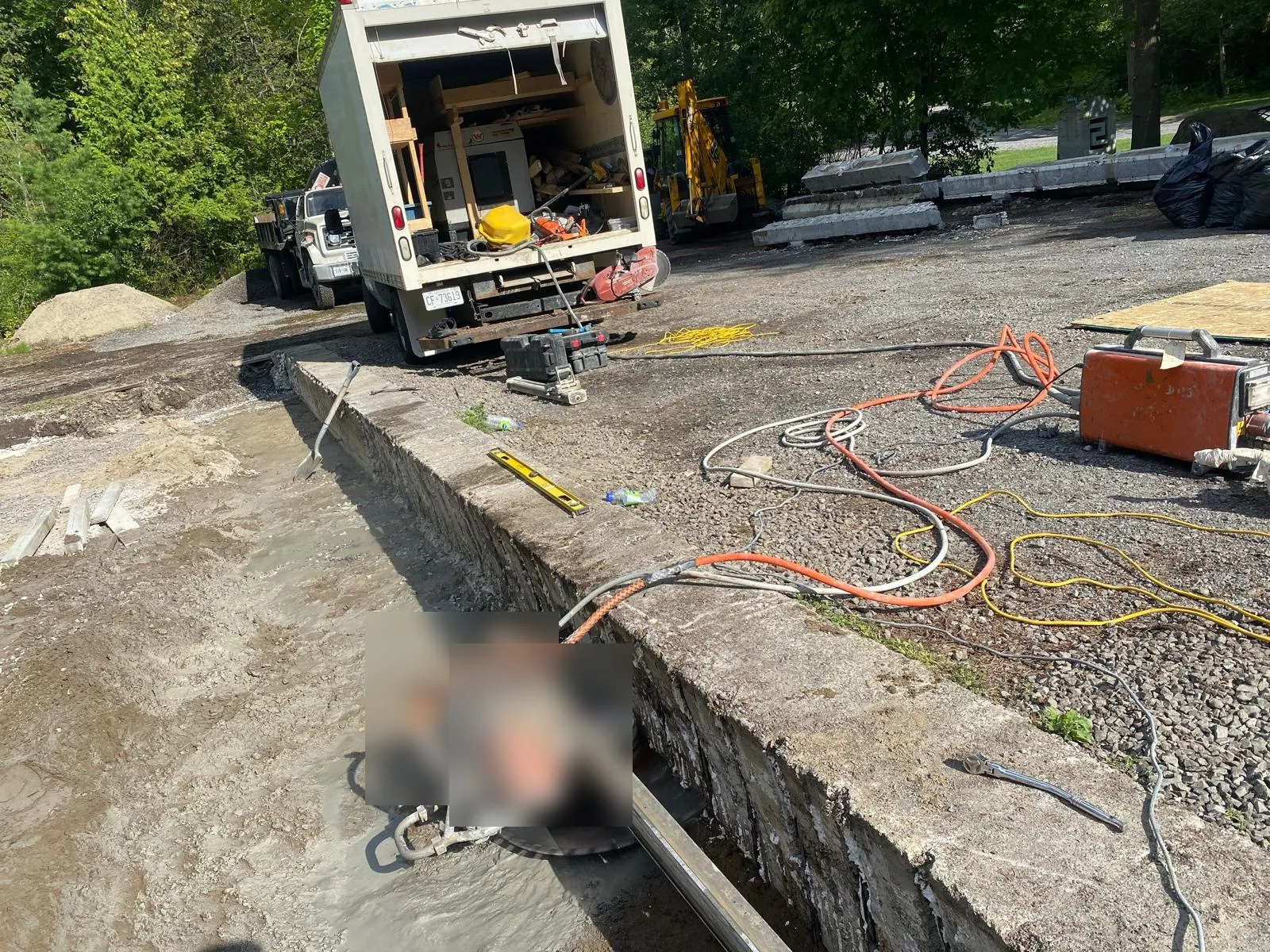 Crew & wall saw on site