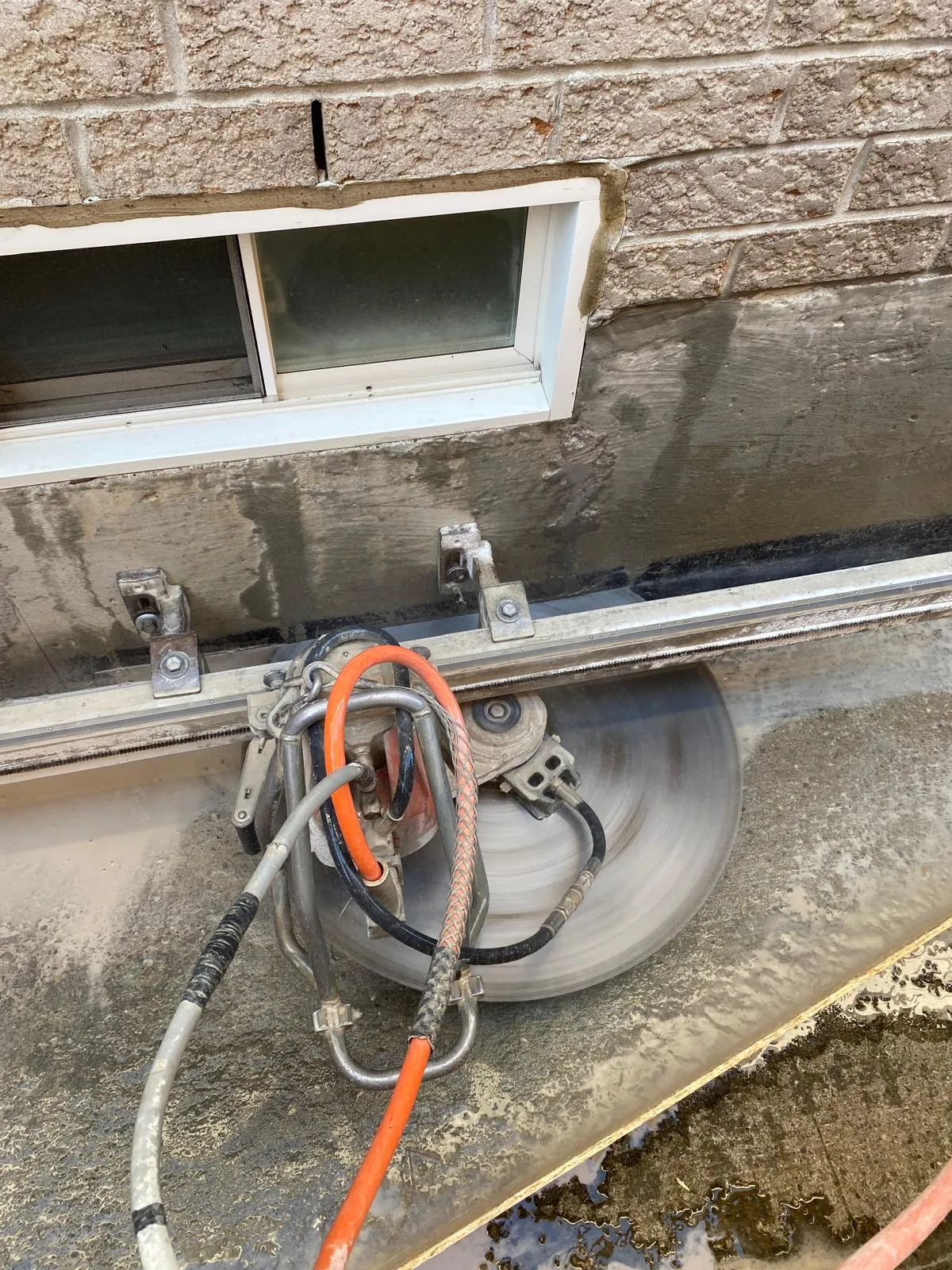 Foundation cut below window