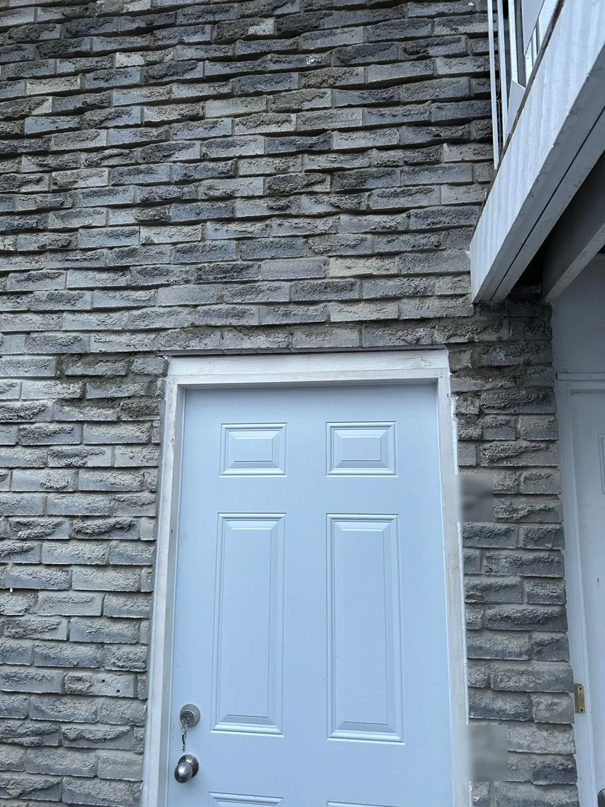 Basement entrance — stone wall